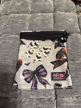 Makeup Junkie Grey Bow Print Pouch with Purple & Orange Accentsl